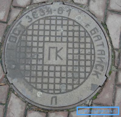 Кришка люка, виконана з чавуну Кришка люка, виконана з чавуну