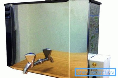 На фото - сталевий навісний рукомийник з електропідігрівом. На фото - сталевий навісний рукомийник з електропідігрівом.